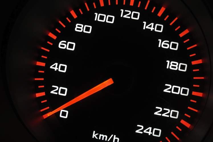 Close up view of a car's speedometer