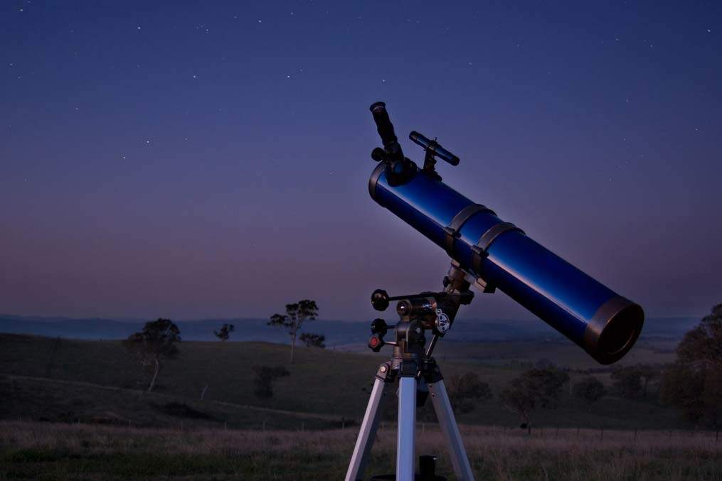 telescope directed as starry sky