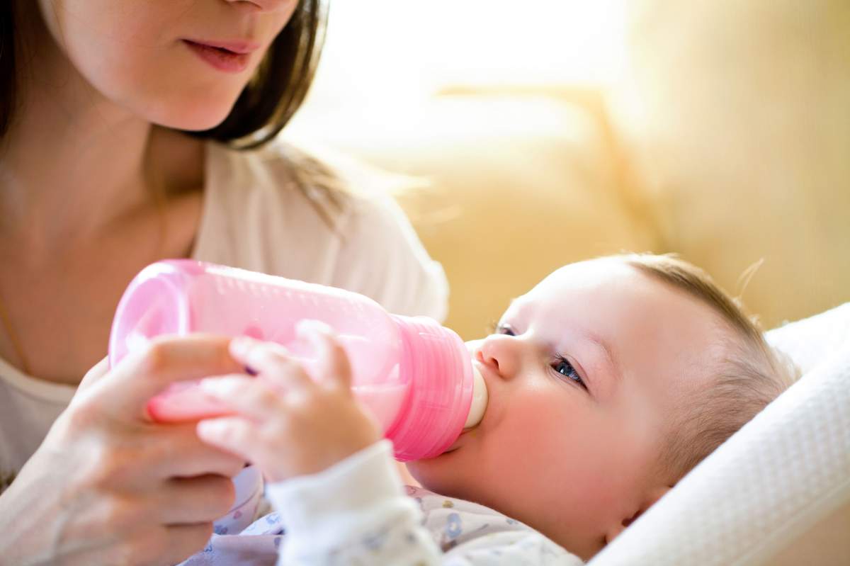 feeding baby with bottle