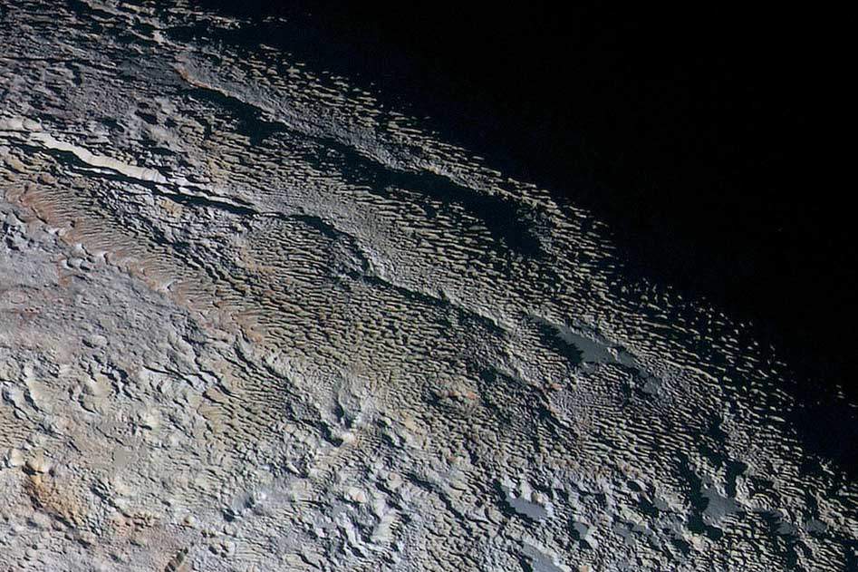 "snakeskin" surface of Pluto taken by New Horizons mission