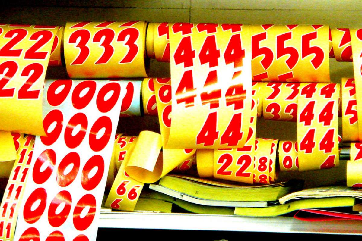 Paper rolls with number patterns. Numbers featured are 2, 3, 4, 5, 0