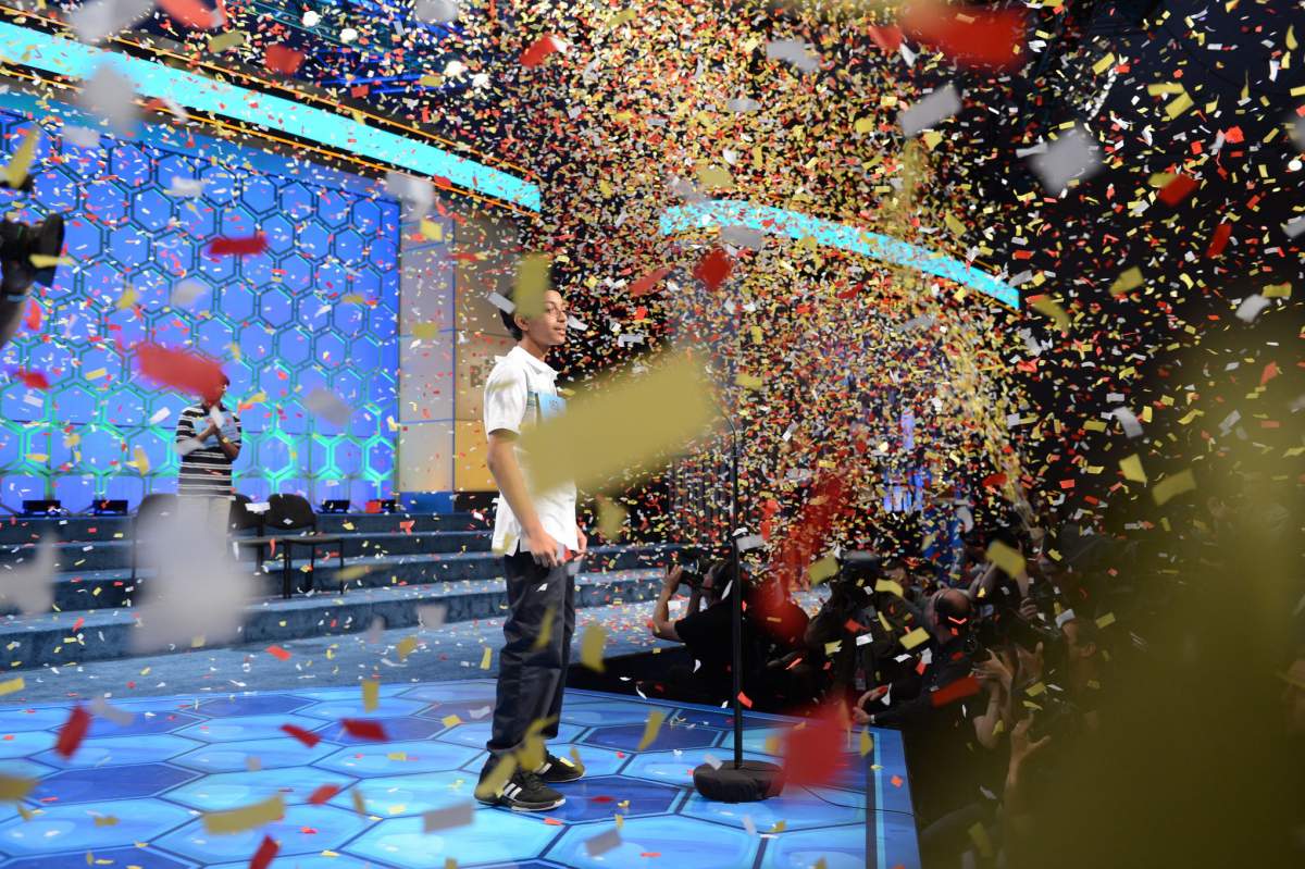 Confetti falls on a child winning a spelling bee