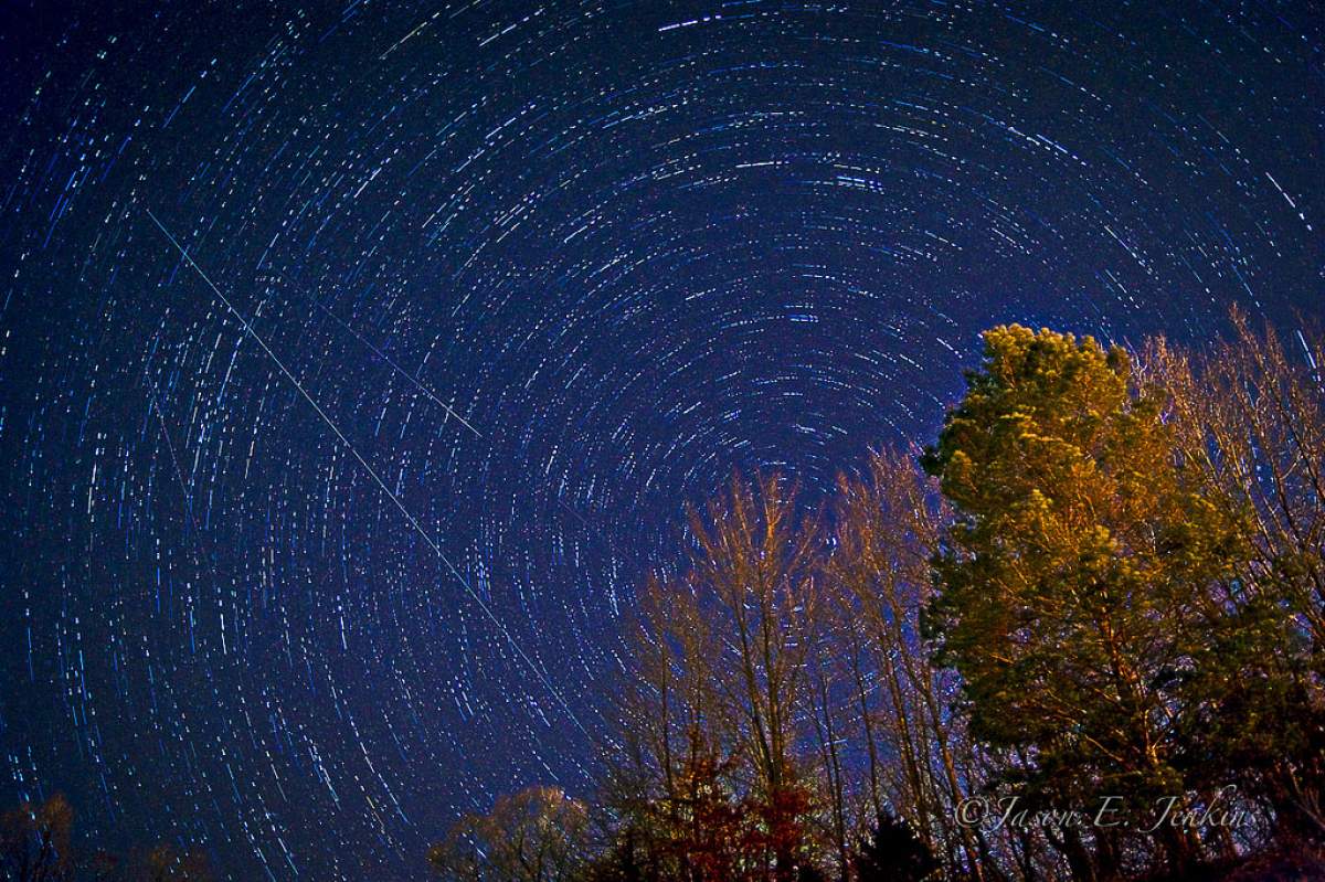 a long exposure shot of a night sky