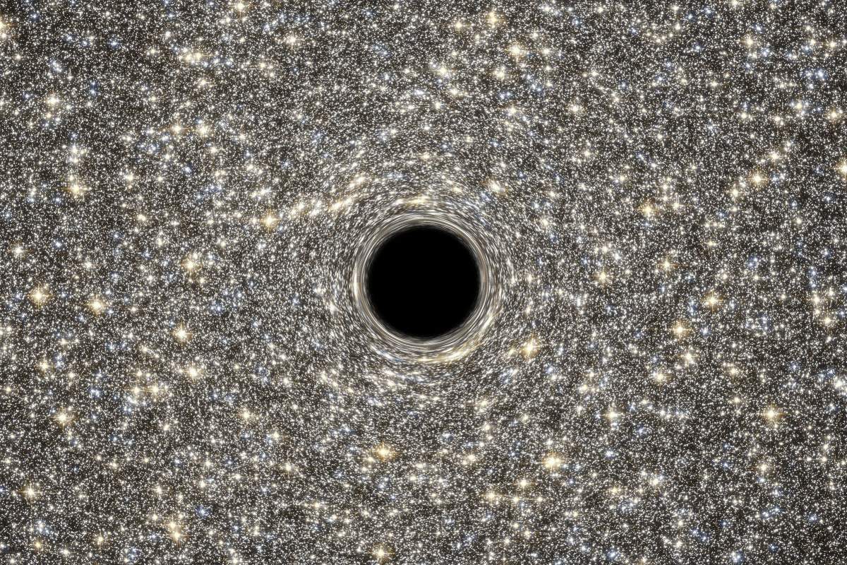 An illustration of a supermassive black hole as it might appear in galaxy M60-UCD1. (NASA Goddard Space Flight Center, Flickr)