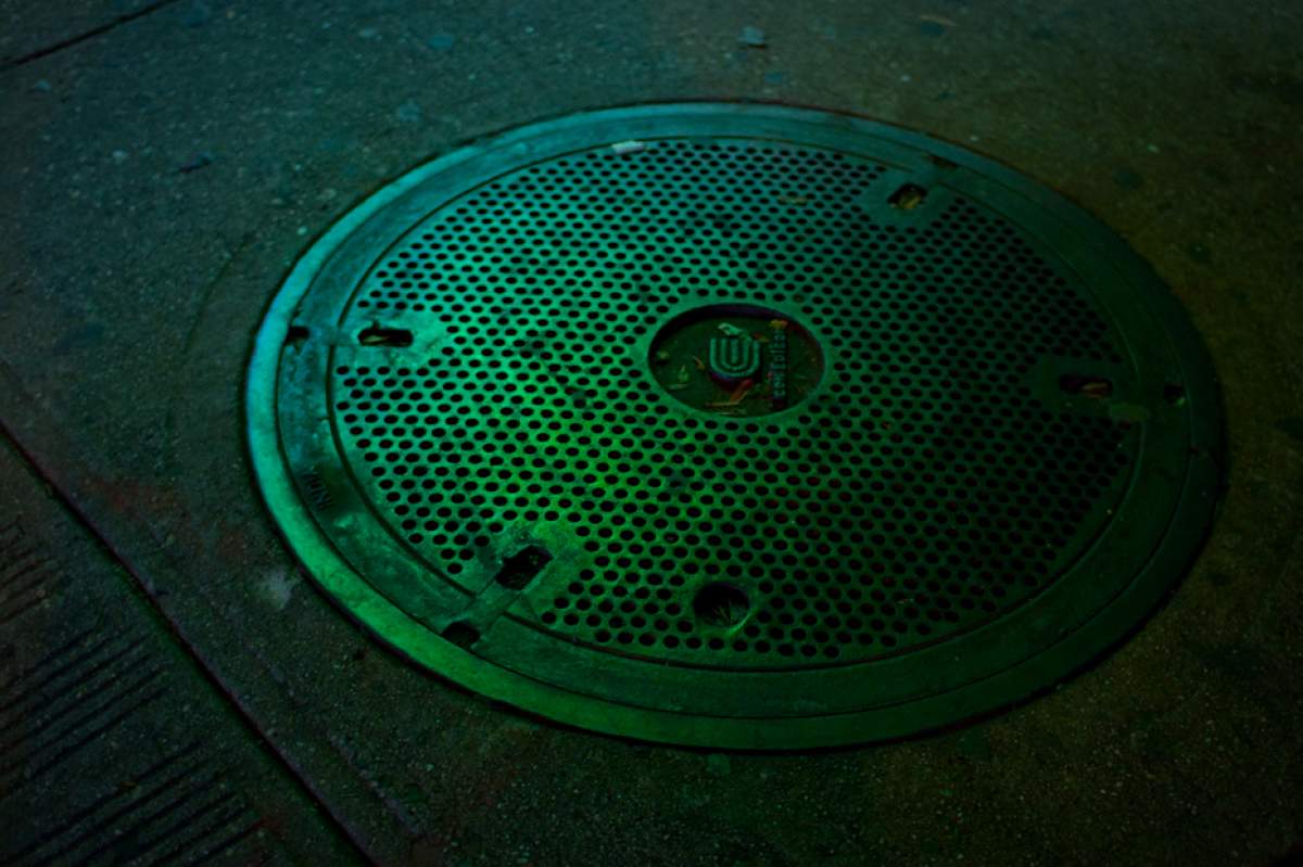 A man hole cover (Devyn Caldwell, Flickr)