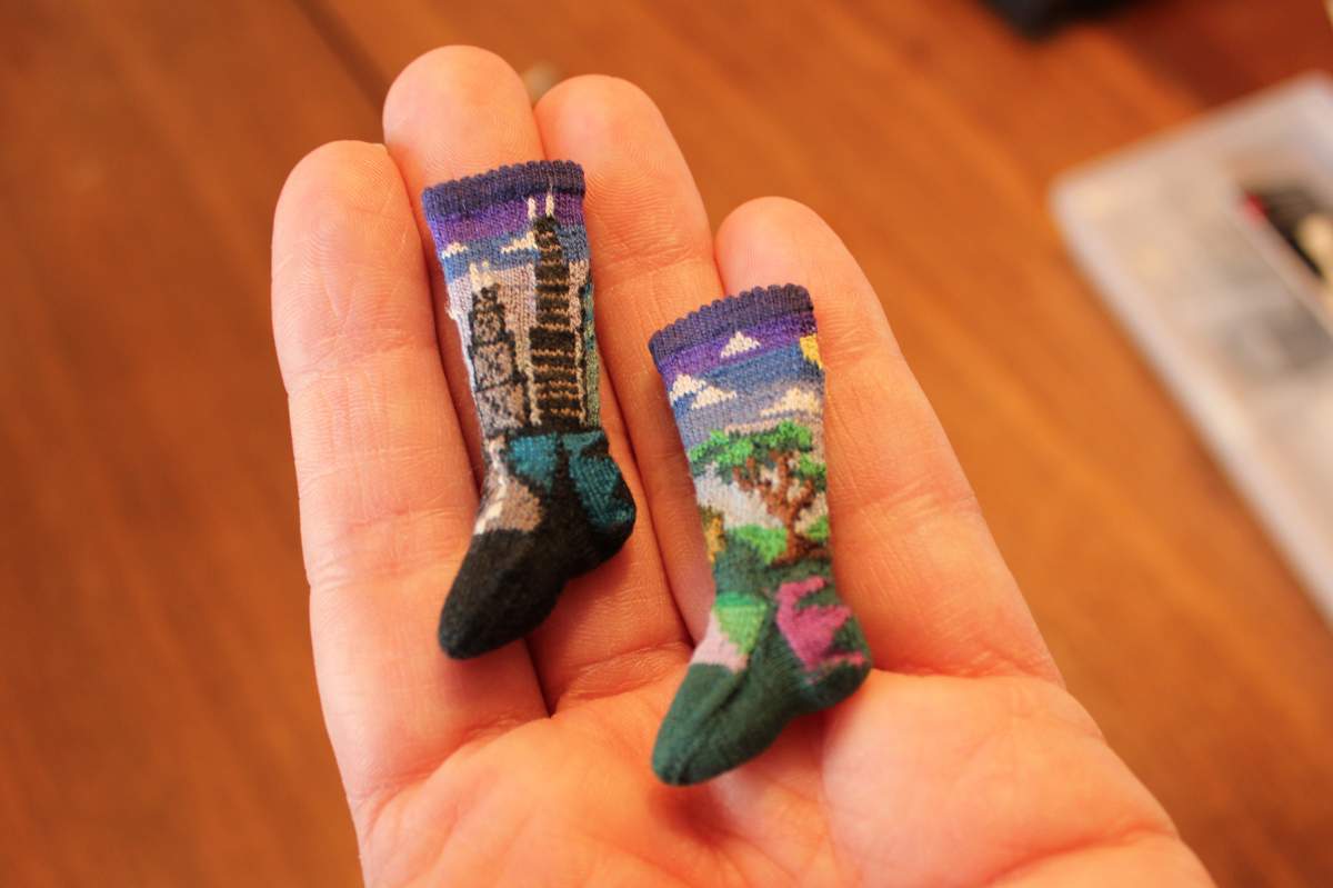 pair of miniature hand-knit socks