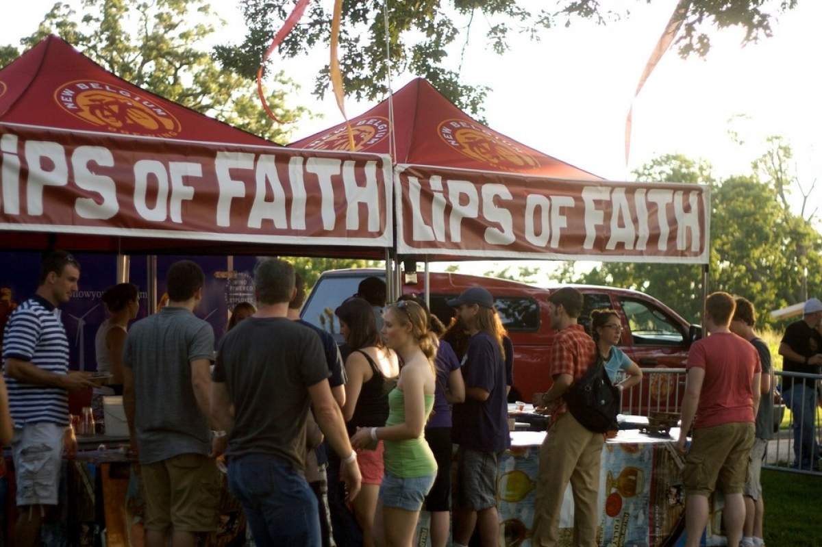 people outside a beer tent at the clips of faith festival