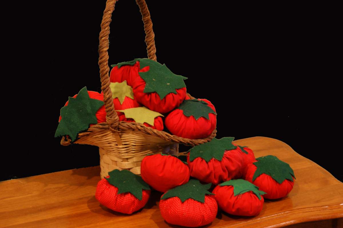 a basket of plush tomatoes