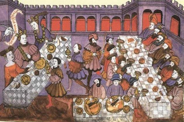 a painting of a medieval feast