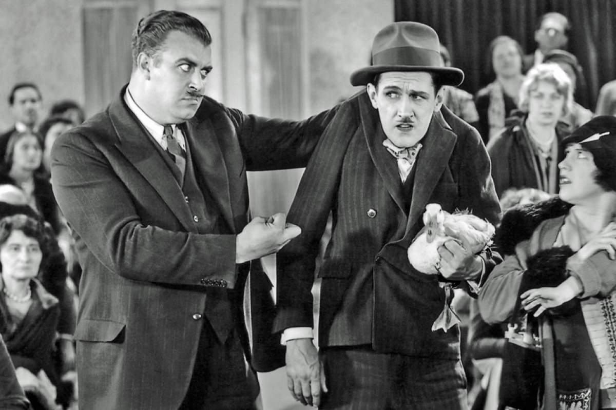 Charley Chase (R) with Tiny Sandford in Movie Night