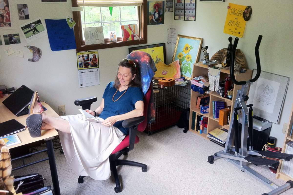 mary ann macklin reading a book in her study