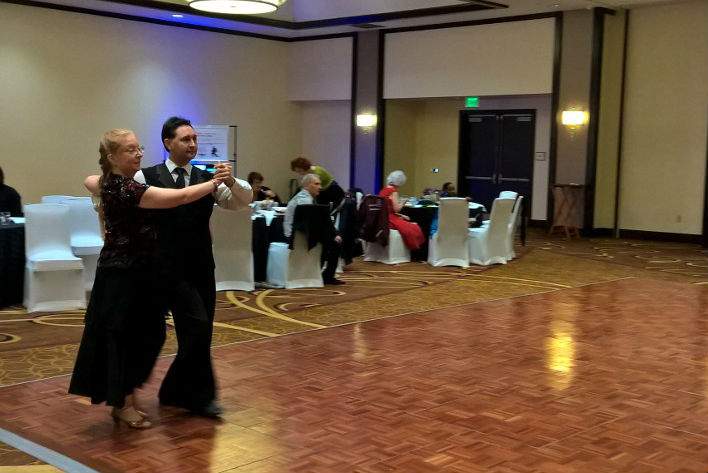 Jannel and another one of her instructors begin a new dance at an Arthur Murray Dance showcase in Indianapolis.