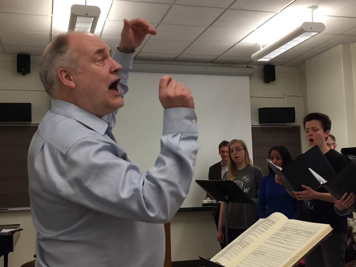 John Butt conducting a choir rehearsal
