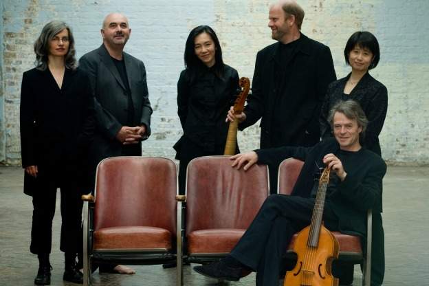 Members of Fretwork. From left to right: Susanna Pell, Richard Tunnicliffe, Reiko Ichise, Richard Boothby, and Asako Morikawa. Seated: former member Richard Campbell who passed away in March 2011.
