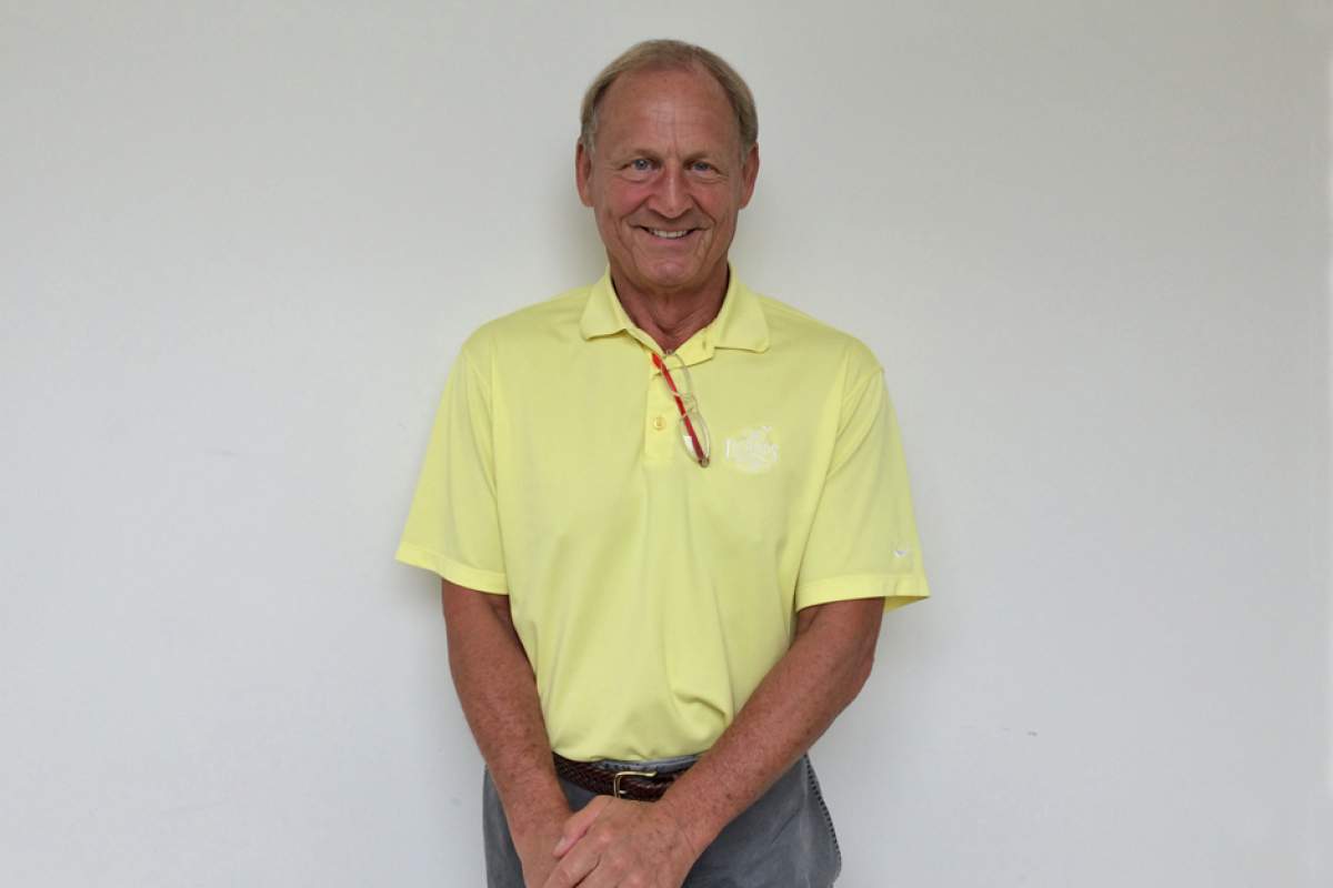 Don Fischer in yellow polo shirt