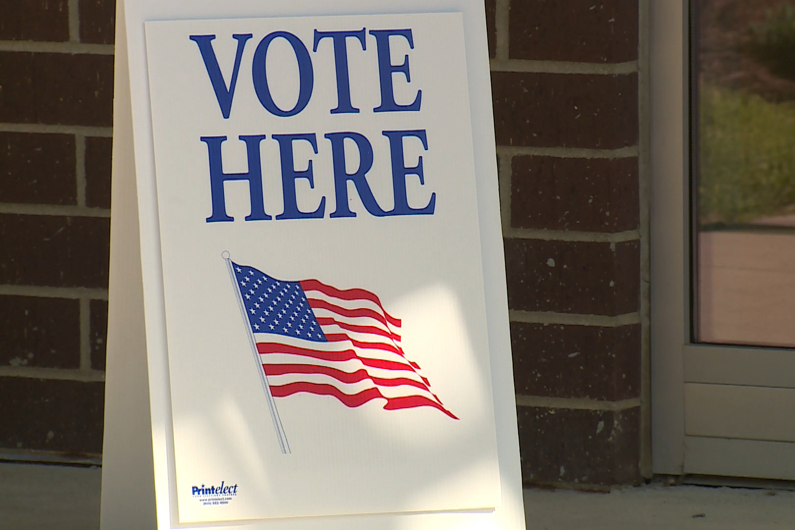 white-vote-here-sign-by-a-door_steve-burns.jpg