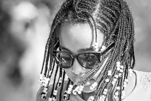 Photo of girl with braids.