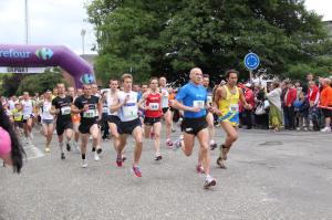 The start of a race as runners begin to jog