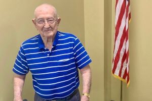 Cass County voter Arthur “Don” Morphet, who turns 102 in May, casts an early ballot in April 2024.