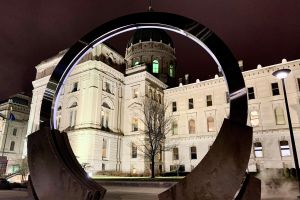 The western exterior of the Indiana Statehouse, at night.