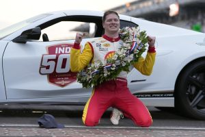 Josef Newgarden celebrates after winning the Indianapolis 500 auto race at Indianapolis Motor Speedway, Sunday, May 26, 2024, in Indianapolis.