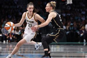 OK Indiana Fever guard Caitlin Clark (22) dribbles as New York Liberty guard Courtney Vandersloot (22) defends during the first half of a WNBA basketball game, Saturday, May 18, 2024, in New York.