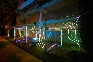 A colorful lighted interactive public art installation