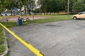 Crime scene tape outlines the area of a shooting at Lincoln Park in Columbus Tuesday night.