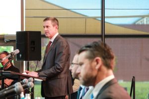 Eli Lilly CEO Dave Ricks announced the investment at a press conference on Oct. 2, 2024. In the foreground are a panel of company and government officials, including U.S. Sen. Todd Young (R-Ind.).