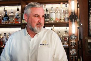 Gov. Eric Holcomb visited the Whistle Stop Inn in Indianapolis on Mar. 14, 2024 to sign into law a bill allowing such establishments to serve happy hours