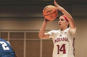 Indiana&amp;amp;amp;apos;s Mackenzie Holmes drives to the basket against Penn State Thursday night.