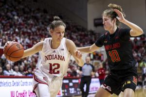 Indiana&amp;apos;s Mackenzie Holmes goes to the basket against Wisconsin Sunday at Simon Skjodt Assembly Hall.