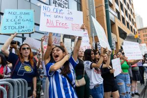 Protesters gather across the streets from Gainbridge Fieldhouse for the From LA to Indy: Ice Out! protest June 11, 2025, in Indianapolis.