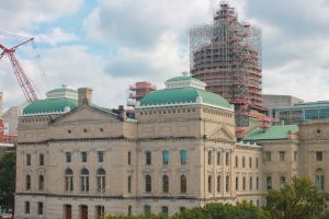 The Indiana Statehouse, as seen from its northwest side. There is scaffolding surrounding its dome.