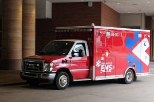 A red Indianapolis EMS unit outside of the Indianapolis convention center.