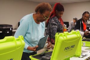 Marion County poll inspectors set up electronic poll-books during training on Thursday, April 19, 2024.
