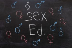 sex ed stock photo, gender symbols on a chalkboard