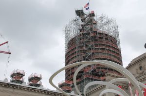 The western exterior of the Indiana Statehouse. The dome is surrounded by scaffolding.