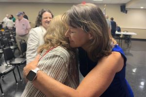 Wendy Dant Chesser, right, hugs Rita Fleming following a Democratic caucus May 29, 2024, in Jeffersonville. Dant Chesser was selected to fill the remainder of Fleming's term as representative for Indiana House District 71.