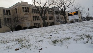 The first snowpack of the winter on the front lawn of Indianapolis' Washington High School.
