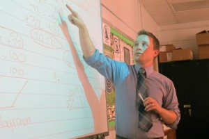 Ryan Davis starts a new unit in his geometry class at Central High School in Louisville, Ky. Davis has been teaching Common Core since 2011 and says the new standards appropriately narrow the number of topics math teachers are expected to cover.