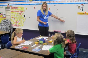 Students at a Jump Start program in Seymour work with their teacher on learning the alphabet. 