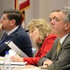 State Board of Education members Brad Oliver (left), state superintendent Glenda Ritz, and Dr. David Freitas listen to presentations at the January board meeting. (Photo Credit: Rachel Morello/StateImpact Indiana)