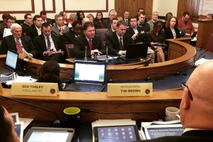 OMB Director Chris Atkins (center) and Budget Director Brian Bailey presenting the governor's budget Thursday to the State Budget Committee. (Photo Credit: Brandon Smith/IPBS)