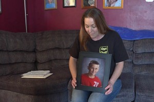 Bloomfield parent Resa Woodruff displays a picture of her son Caswell, 9. (Photo Credit: Barbara Harrington/WTIU News)