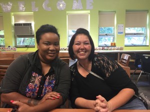 Parents Camelia Smith and Stephanie Hoskins visit the Parent Involvement Center at Francis Bellamy Preschool, where both of their daughters just started a few weeks ago. 
