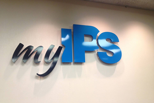 "My IPS" sign hangs in the school board chambers. (Photo Credit: Eric Weddle/WFYI Public Media)