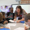 First grade teacher Lindsey Heisler works with students at the Evans School in Evansville, IN. (Peter Balonon-Rosen/StateImpact)