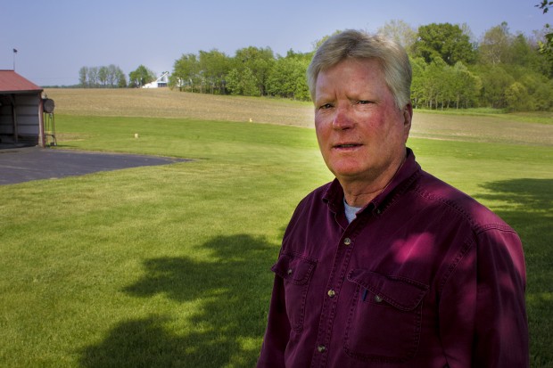Don Thomspon stands in front of farmland he's owned since 1976. He grew up in Argos and dreamed of owning his own farm some day. He says higher taxes would drive business from the area. (Peter Balonon-Rosen/Indiana Public Broadcasting)