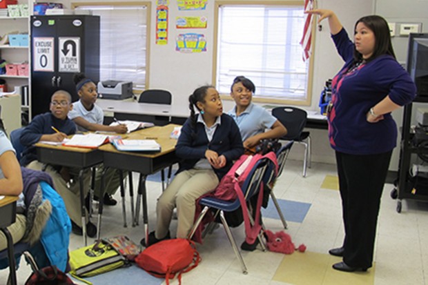 A math teacher leads a lesson on mathematic inequalities at Charter School of the Dunes in Gary. On average, kids in charter schools outperform their traditional public school counterparts in both math and reading. — Photo: Kyle Stokes/StateImpact Indiana